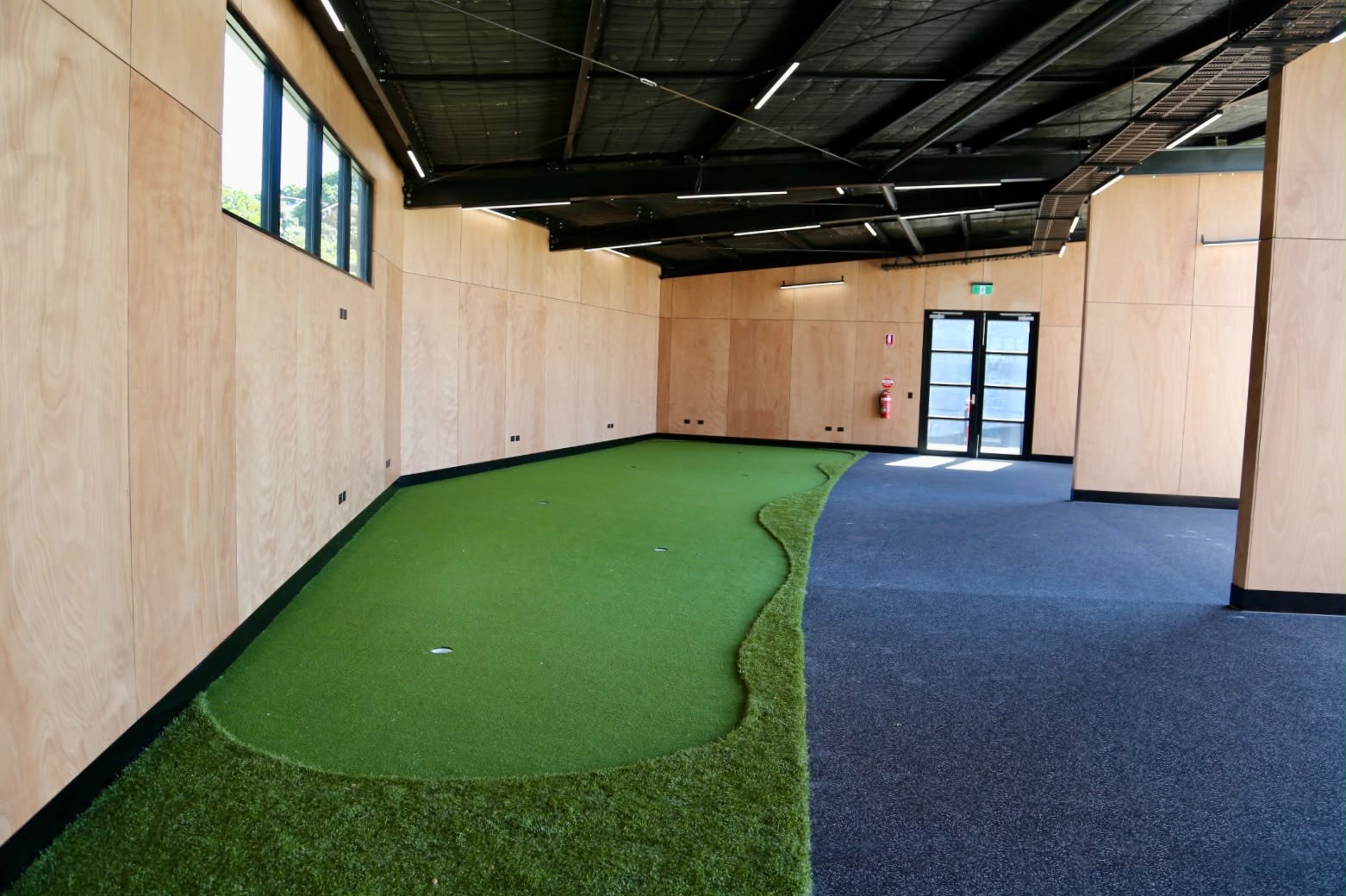 Indoor putting green at The Performance Lab